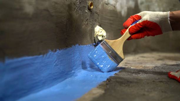 SJ Waterproofing Pros commercial waterproofing team near Lawrence, KS